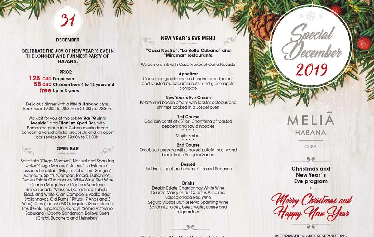 Open New Year's Eve brochure for Melia Habana, three columns of menu and programme text framed by pine branches and baubles